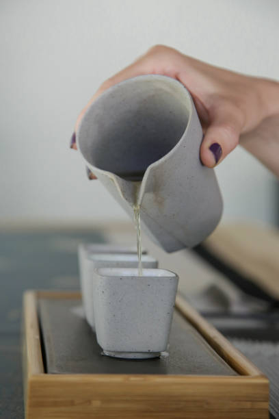 istock Chinese Tea Ceremony experience. Exquisite hot tea at traditional Chinese Tea Ceremony. Caucasian woman participating in a traditional tea ceremony class. 1249313966