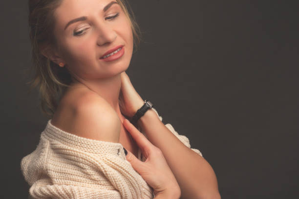 istock portrait of a brunette on a dark gray studio background i 1249318865