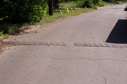 a speed bump on the pavement