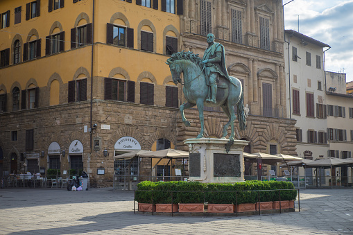 A summer day in at Piazza della Signoria in Florence Italy without tourist. Equestrian statue of Cosimo I de 'Medici is in the picture.
