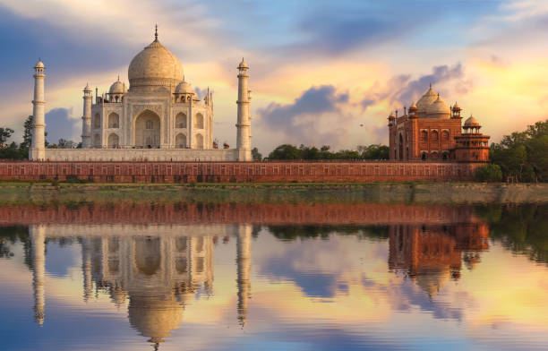 istock Taj Mahal Agra at sunset with water reflection and moody sky 1249327614