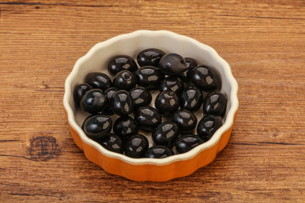 Marinated Black olives in the bowl