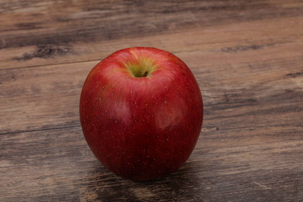 Single Red sweet tasty apple fruit
