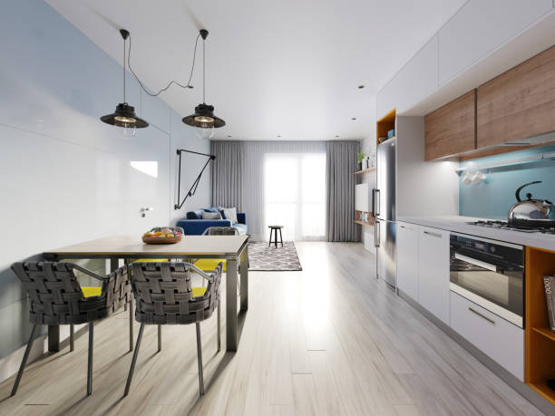 istock small studio apartment with kitchen, dining room and living room with sofa. Interior in blue and white colors and wooden elements. 1249340517