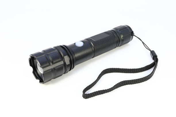 istock Black led water proof  zoom flashlight with pink ribbon isolated on white background 1249340709