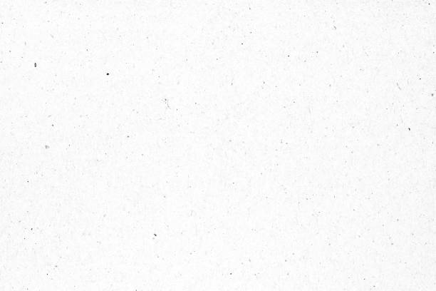 黒いスポットの背景を持つ白い紙または段ボールのテクスチャ。 - フルフレーム ストックフォトと画像