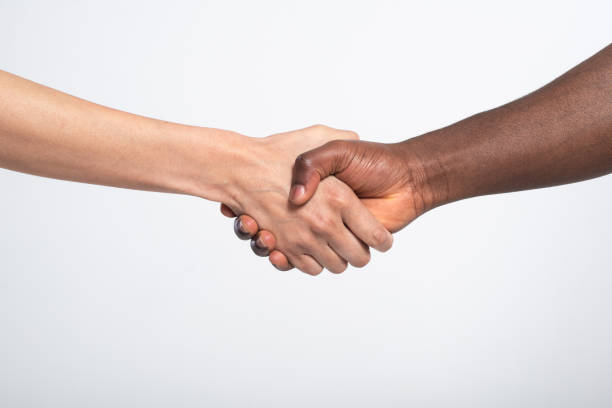istock Anti racist studio shot of a handshake 1249343590