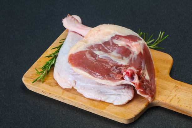istock Raw duck leg served rosemary 1249344034