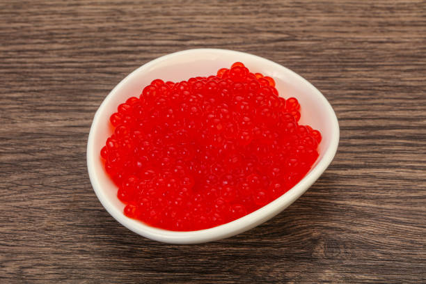 istock Red salmon caviar in the bowl 1249344064