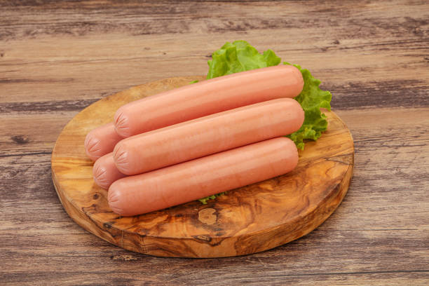 istock Tasty meat sausages over board 1249344931