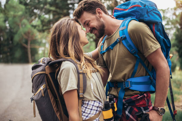 istock Romantic couple hiking on the path in mountains 1249346956