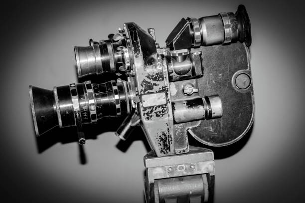 istock Vintage movie camera. Black and white photo. Selective focus. 1249352101
