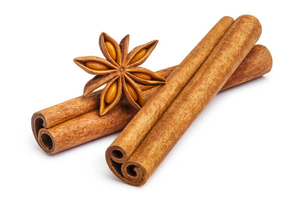 istock Cinnamon and star anise on white 1249353322
