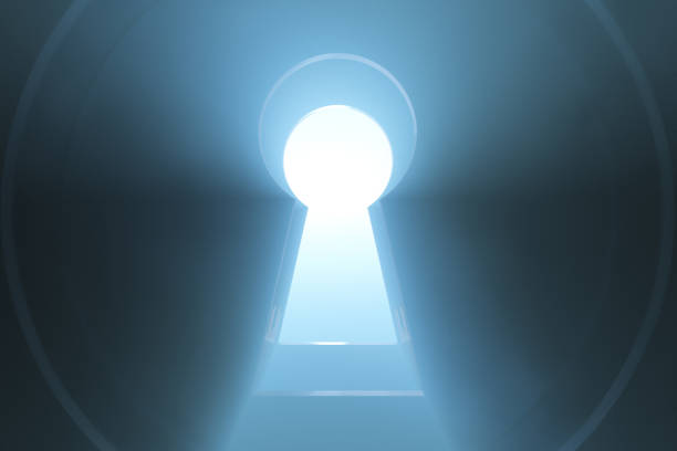 istock The light behind the keyhole. Abstract background. 1249353339