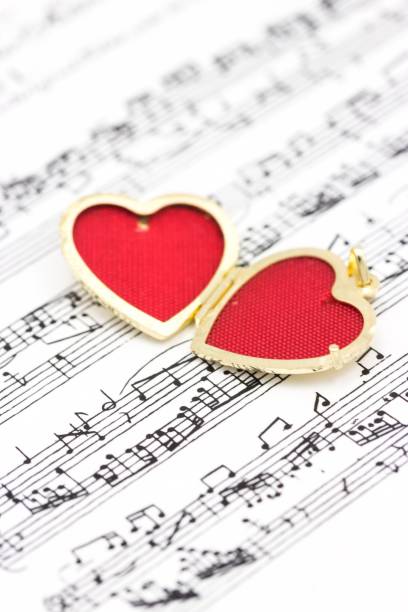 istock Pendant medallion red heart on the notes background 1249353651