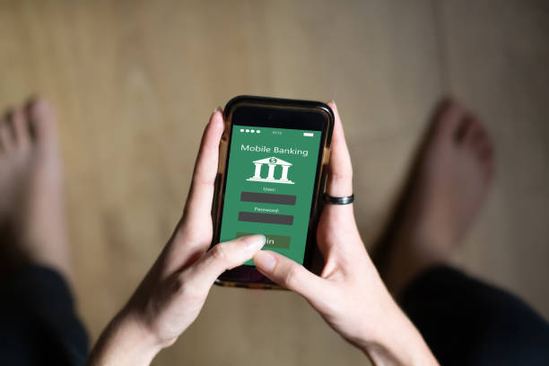 istock young Woman using mobile banking app in her quiet room, zenithal plane, concept of using the bank whenever you want, fintech and young people in finance 1249354582