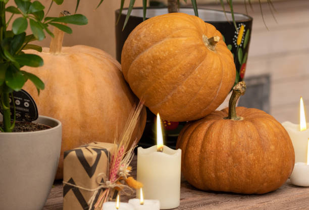 istock Halloween Pumpkins with candles straw 1249355657