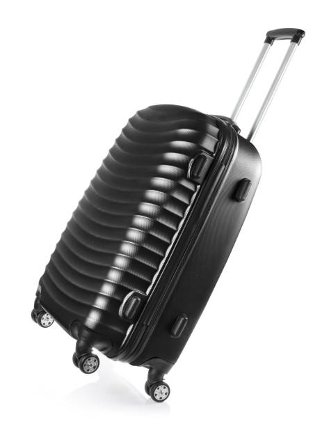 valise noire de voyage sur le blanc - valise à roulettes photos et images de collection