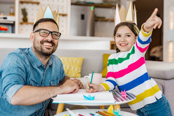 istock Father and daughter play at home and making creative things 1249357574