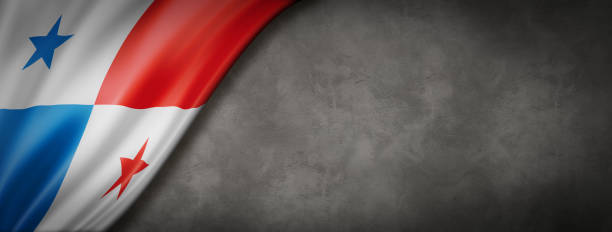 istock Panamanian flag on concrete wall banner 1249357693