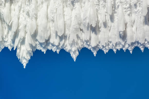 Close-up texture of a massive frost on a blue sky background