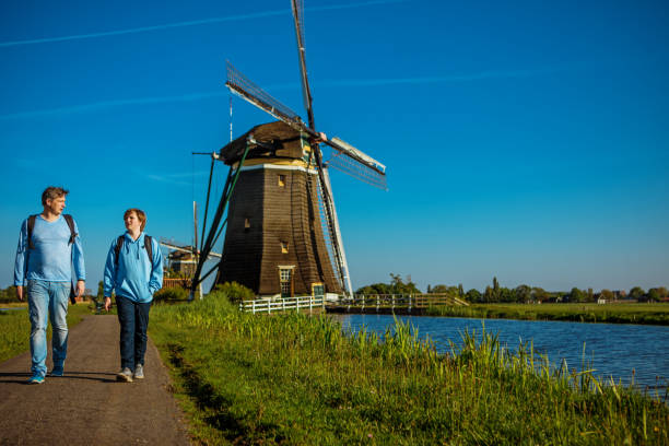 istock A Dutch father and schoolboy at a traditional windmill 1249358902