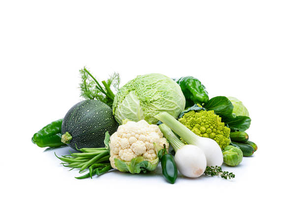 istock Healthy fresh green vegetables isolated on white background. 1249362205