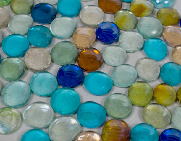 istock Colorful glass stones for decorative and home creativity, handmade. Isolated over light background 1249363243