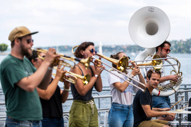 hands of person holding a trumpet. music and marching band concept.