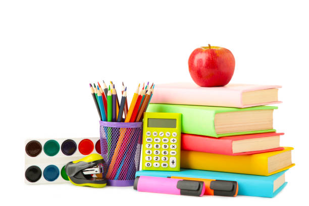 istock Multi coloured school books and stationery isolated on white background 1249365243