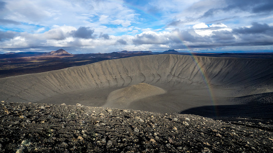 picturesque moon landscape view with a rainbow from hverfjall volcano over to the area of myvatn in iceland