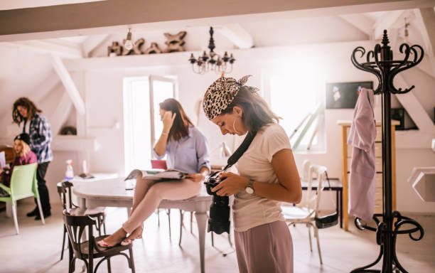 istock Team of young designers  cooperating in the office 1249367494