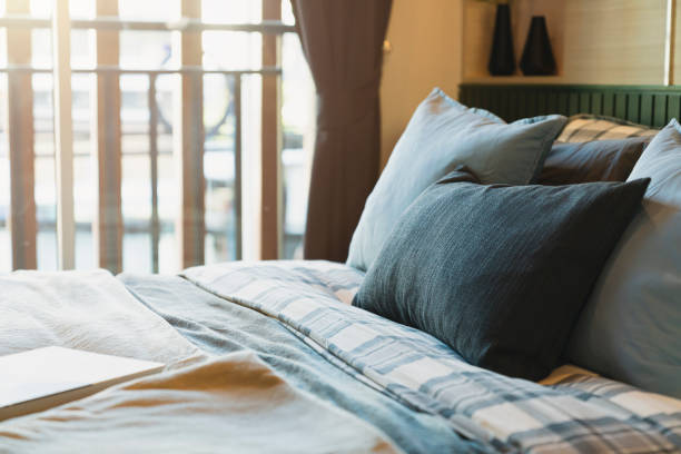 istock close up white beige soft pillows on bed and blanket bedroom interior design concept.bed maid luxury ideas concept 1249367653