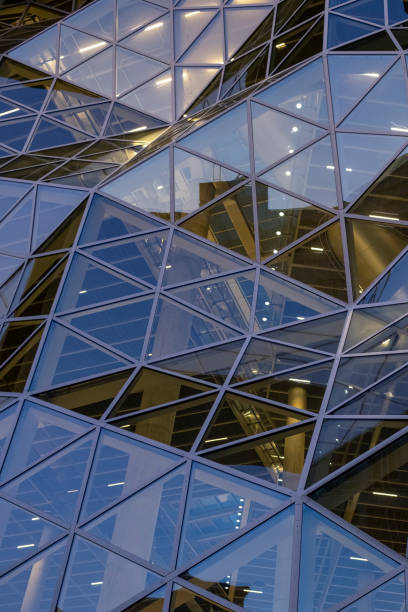 istock close to a folded glass facade in the evening 1249368760