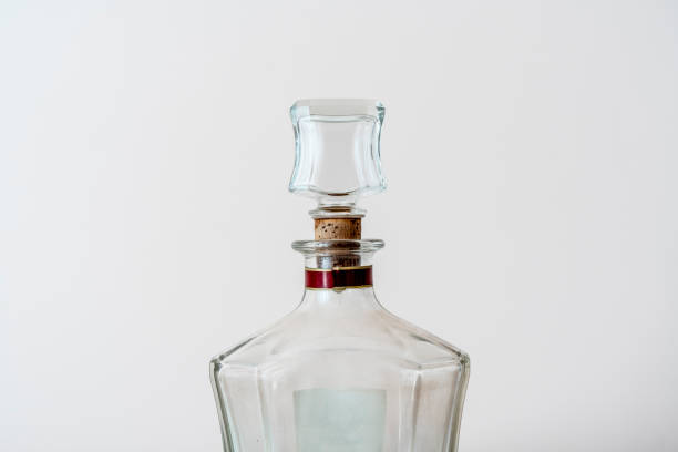 istock simple glass bottle for alcohol mockup, isolated 1249369785