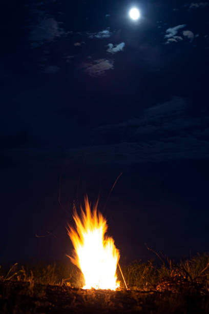 istock campfire night on the background of the moon 1249374846