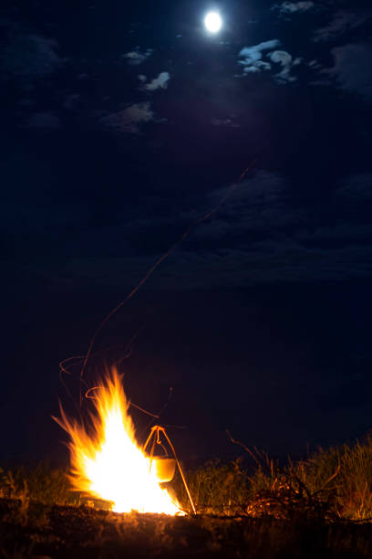 istock campfire night on the background of the moon 1249374893