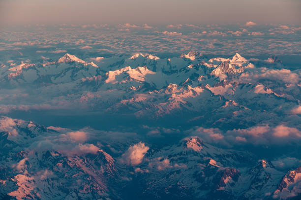 istock Swiss Alps from the Air at Sunrise 1249377056