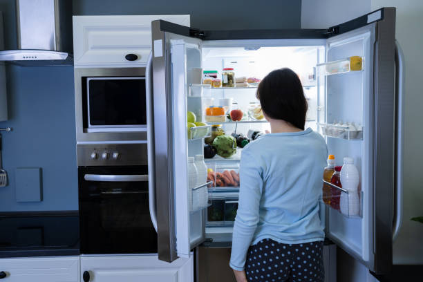 istock Hungry Woman At Night 1249377249