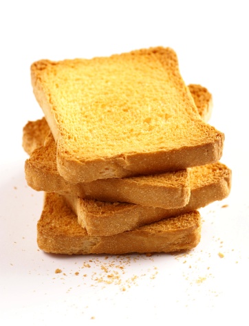 Stack of diet cripbread slices on white background