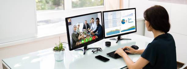 istock Watching Online Video Conference Meeting 1249379640
