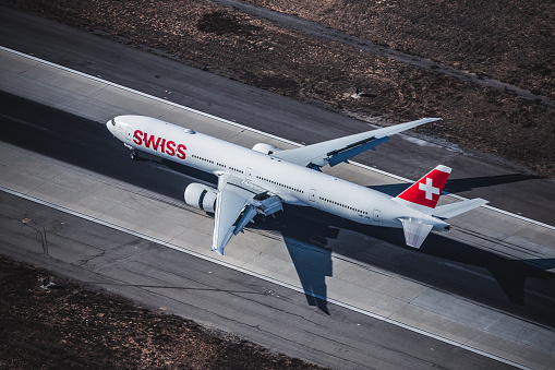 A Swiss Boeing 777 landing in Los Angeles seen from the air.