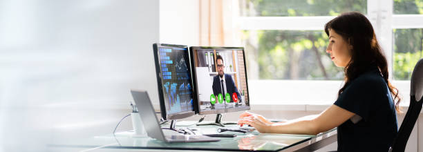 istock Watching Online Video Conference Meeting 1249380118