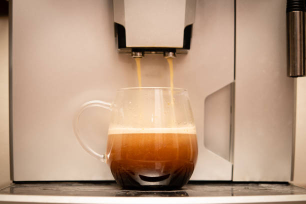 istock Espresso coffee poured into a transparent coffee cup 1249380411