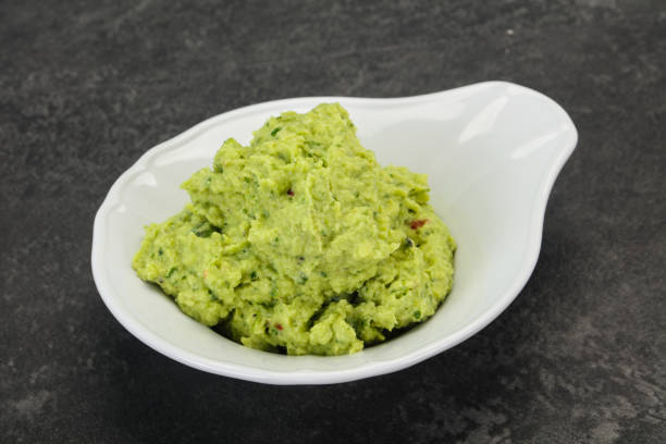 istock Avocado guacamole sauce with chili pepper 1249383192