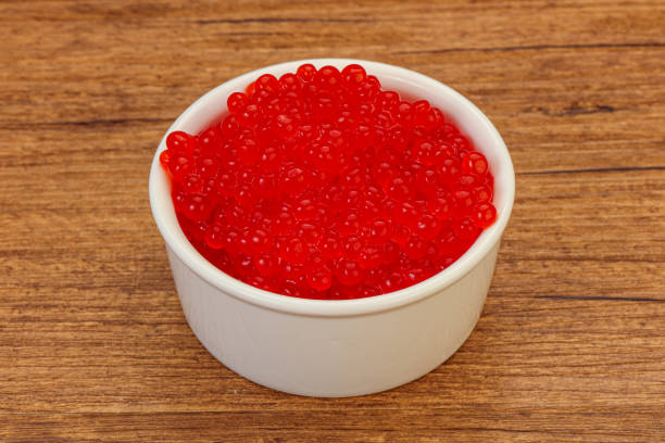 istock Red salmon caviar in the bowl 1249383748