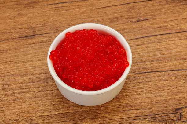 istock Red salmon caviar in the bowl 1249384115