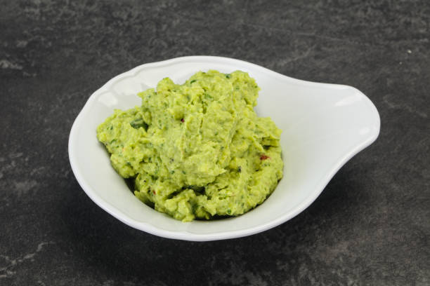 istock Avocado guacamole sauce with chili pepper 1249384209