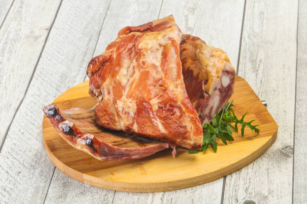 istock Smoked pork ribs over the wooden background 1249384987