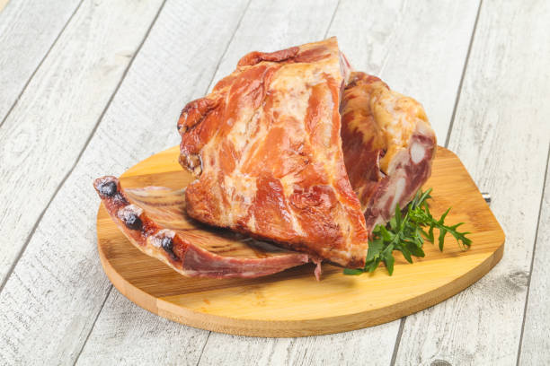 istock Smoked pork ribs over the wooden background 1249385182